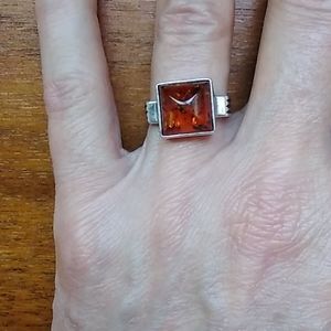 Amber and silver ring.